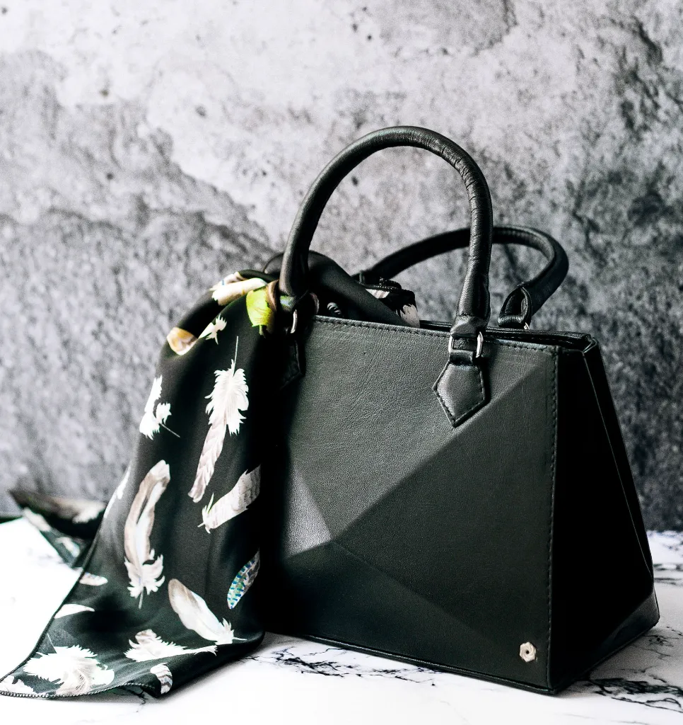 black-bag-with-scarf.webp