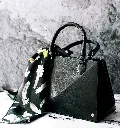 black-bag-with-scarf.webp